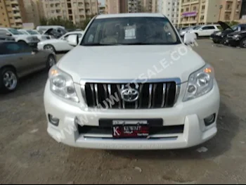Toyota  TX.L  Prado  2012  110,000  SUV  Automatic  6  Cloth  4WD  White  Gasoline