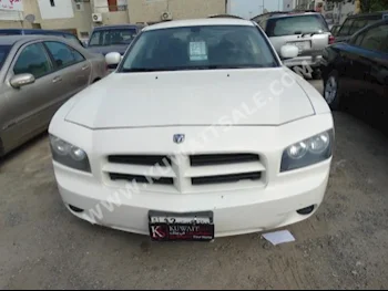 Dodge  Challenger  2009  90,000  Sedan  Automatic  8  Leather  RWD  White  Gasoline