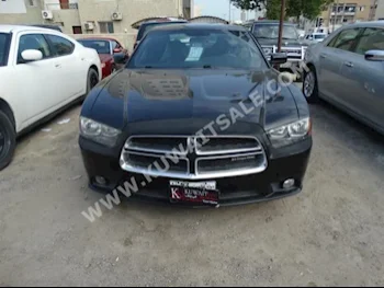 Dodge  Challenger  2011  77,000  Sedan  Automatic  8  Cloth  RWD  Black  Gasoline