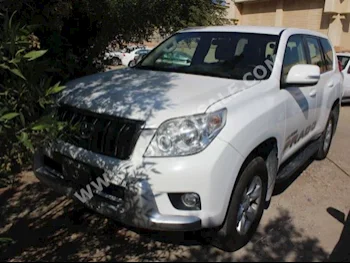 Toyota  TXL  Prado  2012  98,000  SUV  Automatic  6  Cloth  4WD  White  Gasoline