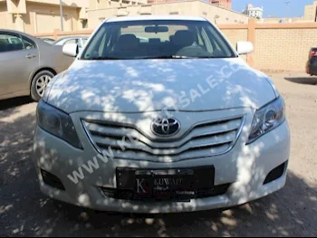 Toyota  GL  Camry  2011  120,000  Sedan  Automatic  4  Cloth  FWD  White  Gasoline