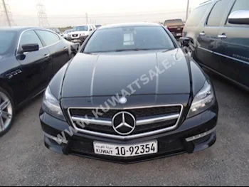 Mercedes-Benz  63 AMG  E-Class  2012  58,000  Sedan  Automatic  8  Leather  RWD  Black  Gasoline