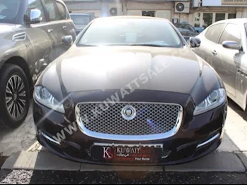 جاكوار  ال  اكس ج  2013  6,000  سيدان  اتوماتك  6  جلد  دفع خلفي  بني  بنزين