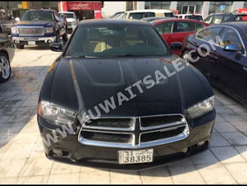 دودج  ار تي  تشارجر  2012  58,000  سيدان  اتوماتك  8  مخمل  دفع خلفي  أسود  بنزين