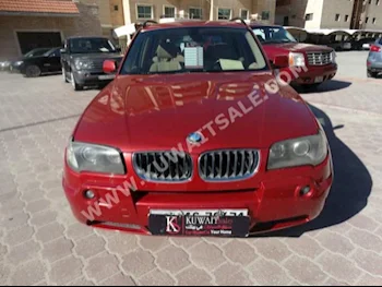 BMW  3  X-Series  2005  176,000  SUV  Automatic  6  Leather  RWD  Red  Gasoline