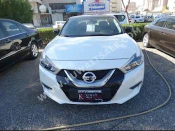 Nissan  Maxima  2016  26,000  Sedan  Automatic  6  Leather  FWD  White  Gasoline