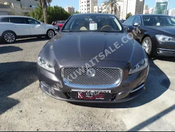 Jaguar  L  XJ  2010  64,000  Sedan  Automatic  8  Leather  RWD  Gray  Gasoline