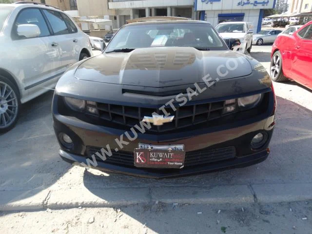 Chevrolet  SS  Camaro  2013  95,000  Coupe / Sport  Manual  8  Leather  RWD  Black  Gasoline