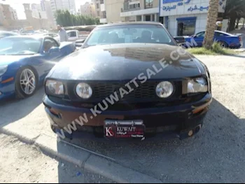 فورد  جي تي  موستانغ  2007  200,000  كوبيه \ سبورت  اتوماتك  8  جلد  دفع خلفي  أسود  بنزين