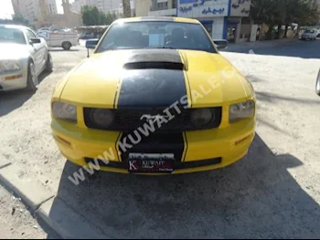 فورد  جي تي  موستانغ  2005  170,000  كوبيه \ سبورت  اتوماتك  8  جلد  دفع خلفي  أصفر  بنزين