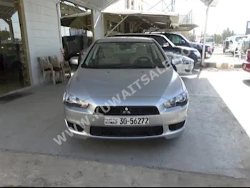 متسوبيشي  جي ال اس  لانسر  2015  0  سيدان  اتوماتك  4  مخمل  دفع أمامي  فضي  بنزين