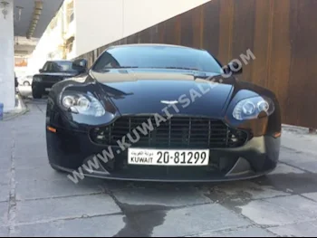أستون مارتن  فانتج  2013  16,000  كوبيه \ سبورت  اتوماتك  8  جلد  دفع خلفي  أسود  بنزين