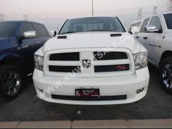 دودج  1500  رام  2012  90,000  بيكب  اتوماتك  8  جلد  دفع رباعي  أبيض  بنزين
