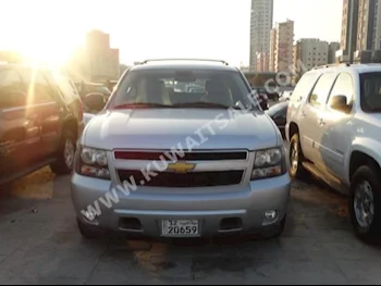 Chevrolet  LT  Tahoe  2014  62,000  SUV  Automatic  8  Cloth  RWD  Silver  Gasoline