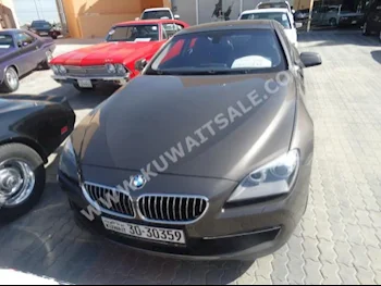 بي ام دبليو  640i  الفئة - السادسة  2014  28,000  كوبيه \ سبورت  اتوماتك  6  جلد  دفع خلفي  بني  بنزين