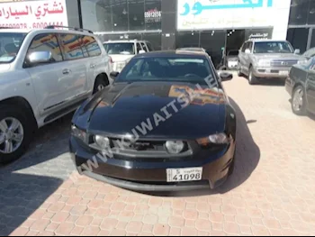 Ford  GT  Mustang  2010  70,000  Coupe / Sport  Manual  8  Leather  RWD  Black  Gasoline