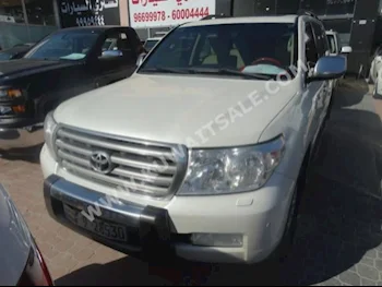 Toyota  GXR  Land Cruiser  2009  255,000  SUV  Automatic  8  Cloth  4WD  White  Gasoline