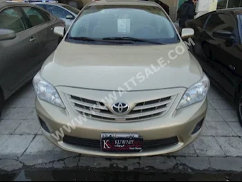 Toyota  XLI  Corolla  2012  81,000  Sedan  Automatic  4  Cloth  FWD  Gold  Gasoline