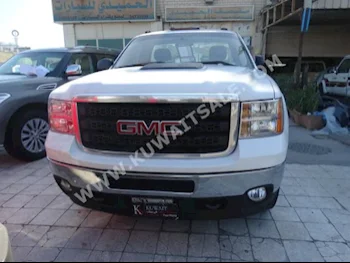 GMC  Sierra  2014  98,000  Pick Up  Automatic  8  Cloth  4WD  White  Gasoline