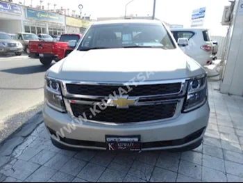 Chevrolet  LS  Tahoe  2015  71,000  SUV  Automatic  8  Cloth  4WD  Gold  Gasoline