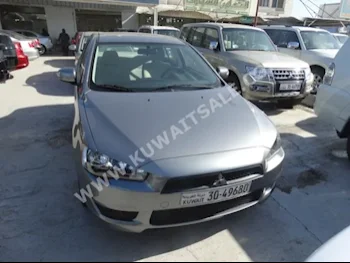 متسوبيشي  لانسر  2015  0  سيدان  اتوماتك  4  مخمل  دفع أمامي  رمادي  بنزين
