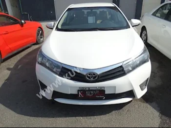 Toyota  XLI  Corolla  2015  54,000  Sedan  Automatic  4  Cloth  FWD  White  Gasoline