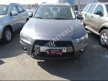 Mitsubishi  Outlander  2010  26,000  SUV  Automatic  6  Cloth  4WD  Gray  Gasoline