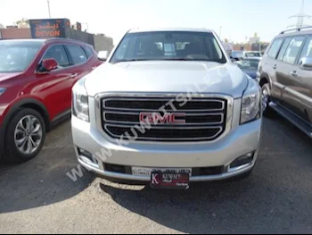 GMC  SLE  Yukon  2015  45,000  SUV  Automatic  8  Cloth  4WD  Silver  Gasoline