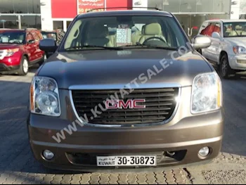 GMC  Yukon  2014  80,000  SUV  Automatic  8  Cloth  RWD  Bronze  Gasoline