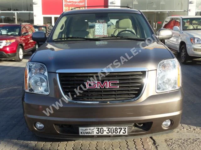 GMC  Yukon  2014  80,000  SUV  Automatic  8  Cloth  RWD  Bronze  Gasoline