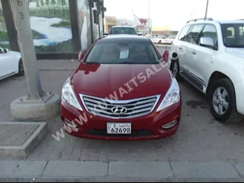 Hyundai  Azera  2015  49,000  Sedan  Automatic  4  Cloth  FWD  Maroon  Gasoline