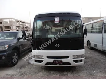 Nissan  Civilian  2013  88,000  Van / Bus  Manual  6  Cloth  RWD  White  Gasoline
