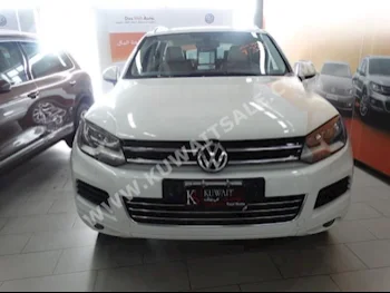 Volkswagen  Touareg  2015  108,000  SUV  Automatic  6  Leather  4WD  White  Gasoline