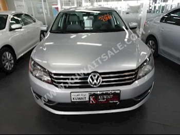Volkswagen  Passat  2013  90,000  Sedan  Automatic  4  Cloth  FWD  Silver  Gasoline