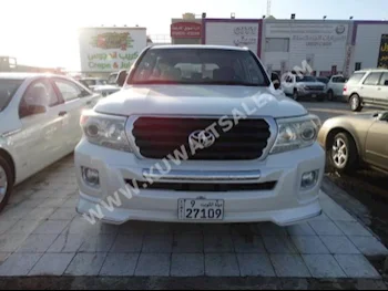 Toyota  GXR  Land Cruiser  2010  160,000  SUV  Automatic  8  Cloth  4WD  White  Gasoline
