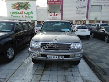 Toyota  GXR  Land Cruiser  2003  290,000  SUV  Manual  8  Cloth  4WD  Gold  Gasoline