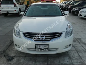 Nissan  2.5 S  Altima  2010  57,000  Sedan  Automatic  4  Cloth  FWD  White  Gasoline