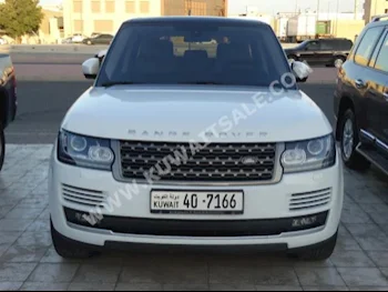 Land Rover  HSE  Range Rover  2015  58,000  SUV  Automatic  8  Leather  4WD  White  Gasoline