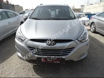 Hyundai  Tucson  2015  15,000  SUV  Automatic  4  Cloth  4WD  Silver  Gasoline