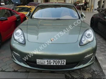 Porsche  Panamera  2011  50,000  Sedan  Automatic  6  Leather  RWD  Green  Gasoline