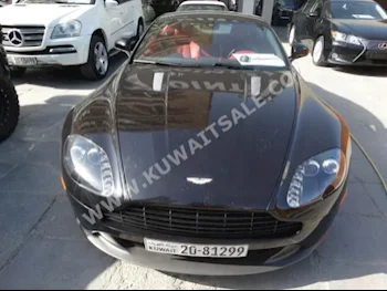 أستون مارتن  أس  دي بي  2013  16,000  كوبيه \ سبورت  اتوماتك  8  جلد  دفع خلفي  أسود  بنزين