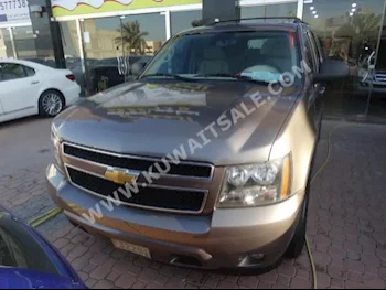 Chevrolet  LT  Tahoe  2012  165,000  SUV  Automatic  8  Cloth  RWD  Bronze  Gasoline