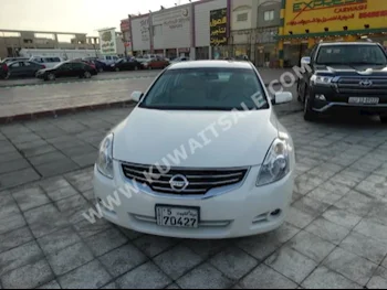 Nissan  2.5 S  Altima  2010  57,000  Sedan  Automatic  4  Cloth  FWD  White  Gasoline