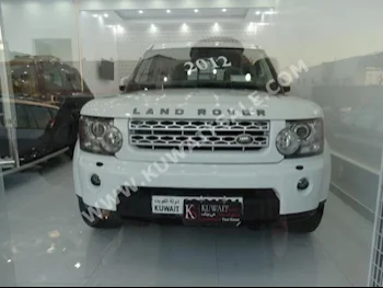 Land Rover  Vogue SE  Range Rover  2012  94,000  SUV  Automatic  8  Leather  4WD  White  Gasoline