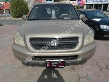 هوندا  بايلوت  2003  167,000  اس يو في  اتوماتك  6  جلد  دفع رباعي  ذهبي  بنزين