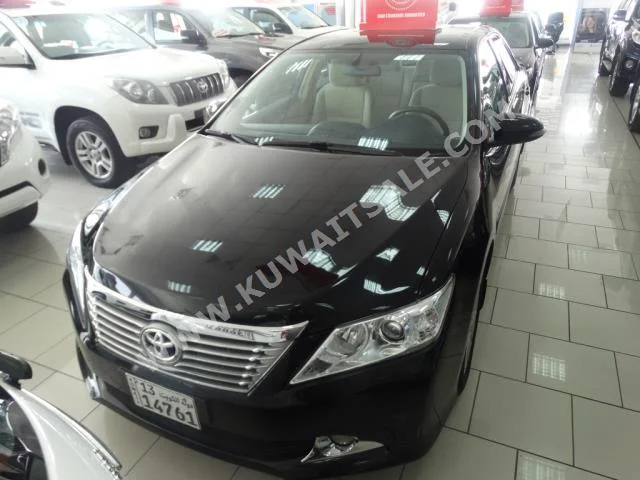 Toyota  Touring  Aurion  2015  23,000  Sedan  Automatic  4  Cloth  FWD  Black  Gasoline