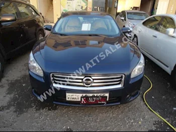 Nissan  Maxima  2014  39,000  Sedan  Automatic  6  Cloth  FWD  Blue  Gasoline