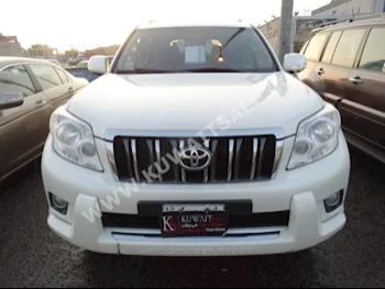 Toyota  TX.L  Prado  2013  117,000  SUV  Automatic  6  Cloth  4WD  White  Gasoline