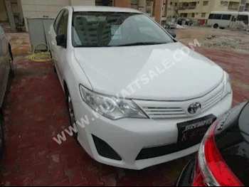Toyota  GL  Camry  2015  35,000  Sedan  Automatic  4  Cloth  FWD  White  Gasoline