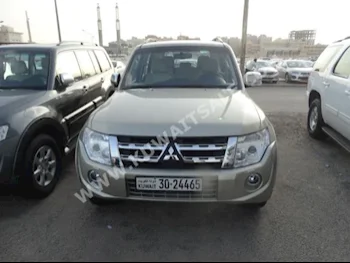 Mitsubishi  GLS  Pajero  2014  65,000  SUV  Automatic  6  Cloth  4WD  Gold  Gasoline